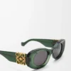 Abgeschrägte ovale Maxi-Anagram-Sonnenbrille Dunkelgrün