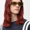 Abgeschrägte ovale Maxi Anagram Sonnenbrille Transparent Olive