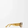 Abgeschrägte ovale Maxi Anagram Sonnenbrille Transparent Olive
