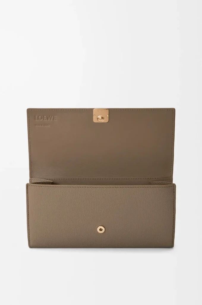 Anagram Continental-Brieftasche aus pebble-genarbtem Kalbsleder Taupe