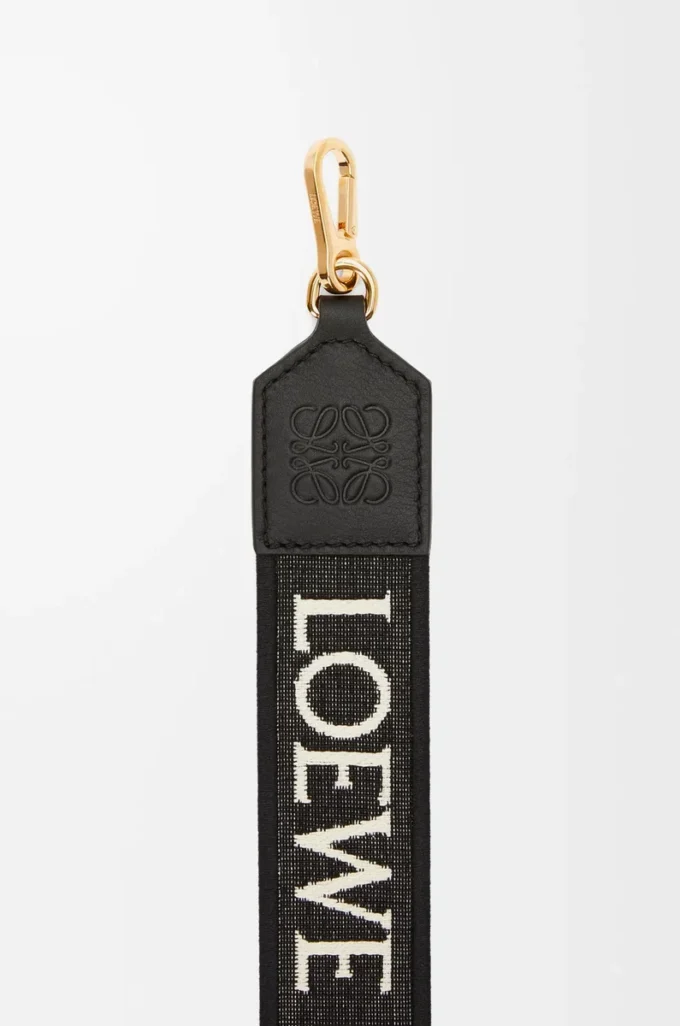 Anagram-Riemen aus Jacquard und Kalbsleder Schwarz/Gold