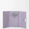 Anagram Schlüsselanhänger aus genarbtem Kalbsleder in Dirty Mauve