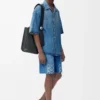 Anagram-Shorts aus Denim Gewaschener Denim