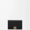 Anagram Visitenkartenetui aus genarbtem Kalbsleder Black/Gold