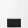 Anagram Visitenkartenetui aus genarbtem Kalbsleder Black/Gold
