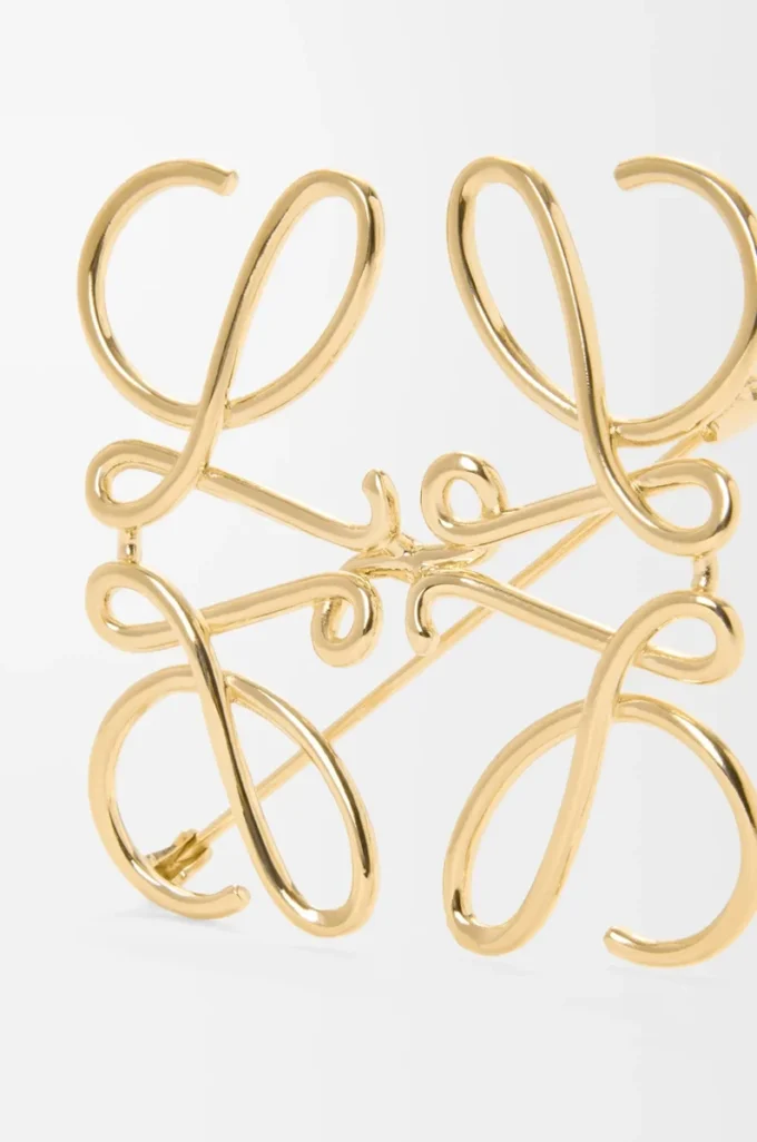 Anagramm-Brosche aus Metall in Gold