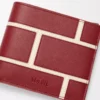 Bifold-Brieftasche aus klassischem Kalbsleder in Burnt Red