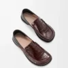 Campo Loafer mit Klappe aus geprägtem Kalbsleder und Nappalammleder Dunkelbraun/Schwarz