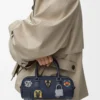 Cats Amazona 23 verkürzte Tasche aus besticktem Denim Blau