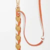 Dünner geflochtener Riemen aus klassischem Kalbsleder in Soft White/Maple Orange