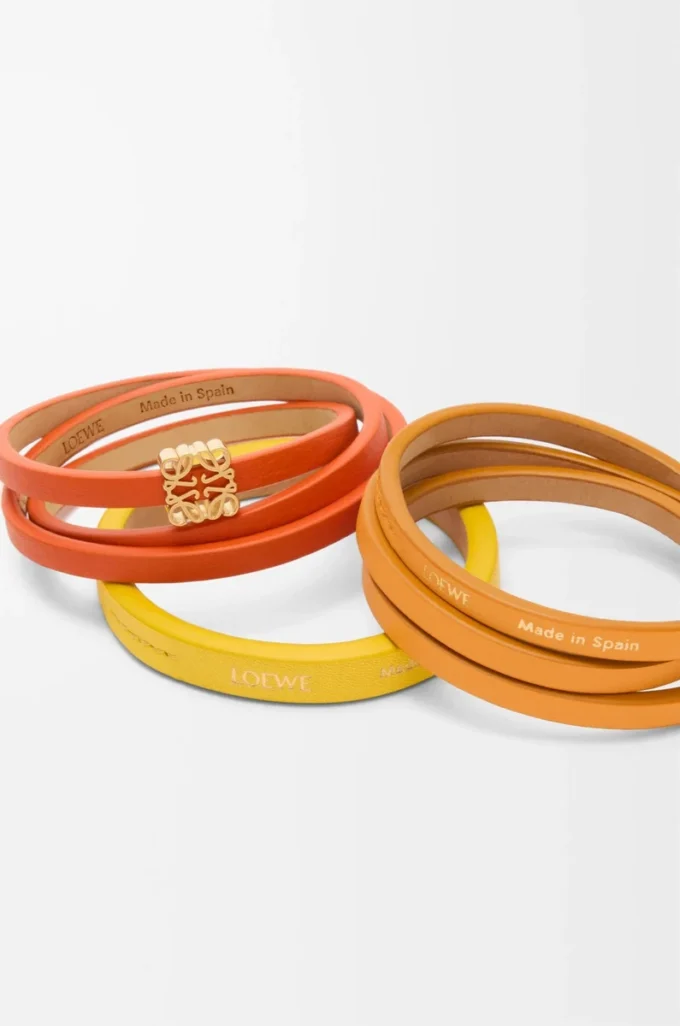 Doppelt gewundenes Armband aus Kalbsleder in leuchtendem Orange/Gelb
