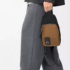 Flex Sling aus Canvas und Wildleder Schwarz/Dunkelgold