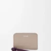 Geldbörse mit Reißverschluss aus glänzendem Nappaleder in Clay/Plum