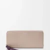 Geldbörse mit Reißverschluss und Knotenverschluss aus glänzendem Nappakalbsleder Clay/Plum