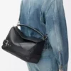 Große Puzzle Biker-Tasche aus glänzendem Kalbsleder in Schwarz