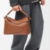 Große Puzzle Edge Tasche aus klassischem Kalbsleder Tan