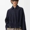 Gürteljacke aus Wolle und Seide Marineblau