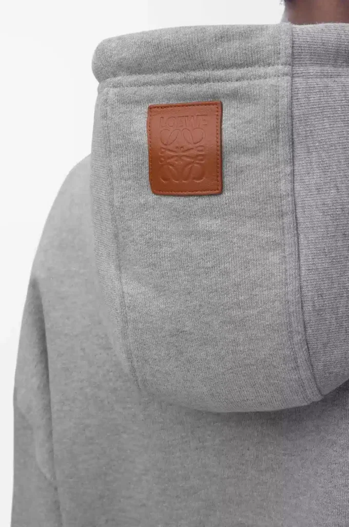 Hoodie in lockerer Passform aus Baumwolle in Grau Melange