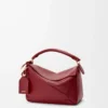 Kleine Featherlight Puzzle Tasche aus Nappalammleder in Burnt Red
