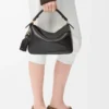 Kleine Featherlight Puzzle Tasche aus Nappalammleder in Schwarz