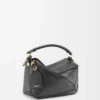 Kleine Featherlight Puzzle Tasche aus Nappalammleder in Schwarz