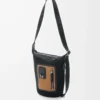 Kleine Flex Loop Bucket Bag aus Canvas und Wildleder in Schwarz/Dunkelgold