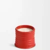 Kleine Kerze mit Tomatenblättern, rot