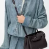 Kleine Madrid-Tasche aus geschmeidigem genarbtem Kalbsleder Dark Ebony
