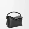 Kleine Puzzle Edge Tasche aus klassischem Kalbsleder in Schwarz