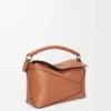 Kleine Puzzle Edge Tasche aus klassischem Kalbsleder in Tan