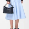 Kleine Puzzle Edge Tasche aus weichem genarbtem Kalbsleder Deep Navy