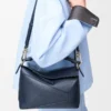 Kleine Puzzle Edge Tasche aus weichem genarbtem Kalbsleder Deep Navy