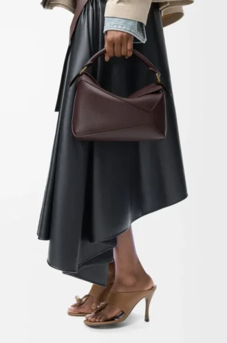 Kleine Puzzle Edge Tasche aus weichem genarbtem Kalbsleder in Dark Chestnut