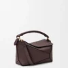 Kleine Puzzle Edge Tasche aus weichem genarbtem Kalbsleder in Dark Chestnut