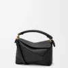 Kleine Puzzle Edge Tasche aus weichem genarbtem Kalbsleder in Schwarz