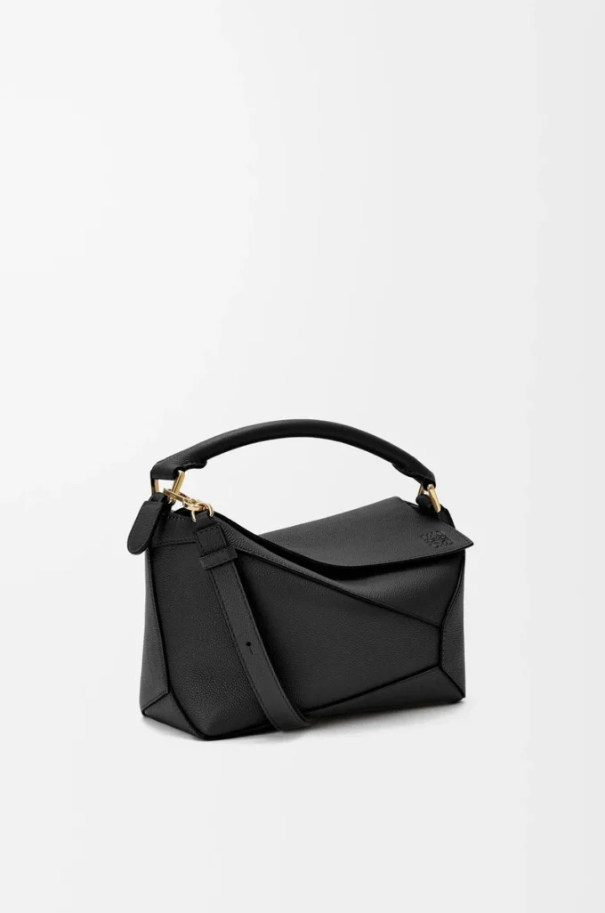 Kleine Puzzle Edge Tasche aus weichem genarbtem Kalbsleder in Schwarz
