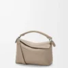 Kleine Puzzle Edge Tasche aus weichem genarbtem Kalbsleder in Ton
