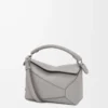 Kleine Puzzle Edge Tasche aus weichem genarbtem Kalbsleder Perlgrau