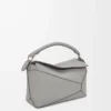 Kleine Puzzle Edge Tasche aus weichem genarbtem Kalbsleder Perlgrau