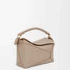 Kleine Puzzle Edge Tasche aus weichem genarbtem Kalbsleder Sand