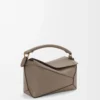 Kleine Puzzle Edge Tasche aus weichem genarbtem Kalbsleder Taupe