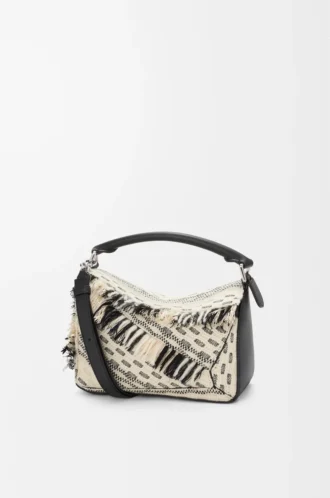 Kleine Puzzle-Tasche aus gewebtem Textil in Schwarz/Weiß