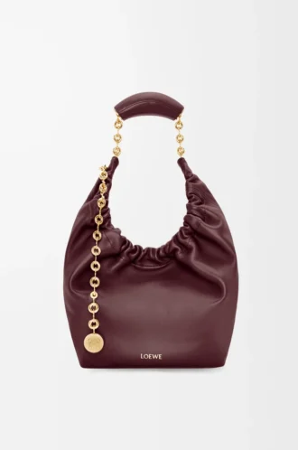 Kleine Squeeze-Tasche aus weichem Nappalammleder in Dunkelburgunder