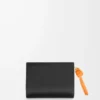Knot Kompaktbrieftasche aus glänzendem Nappakalbsleder Schwarz/Leuchtendes Orange