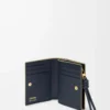 Kompakte Geldbörse mit Knoten aus glänzendem Nappakalbsleder Eukalyptus/Deep Navy