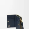 Kompakte Geldbörse mit Knoten aus glänzendem Nappakalbsleder Eukalyptus/Deep Navy