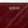 Kompakte Geldbörse mit Knotenverschluss aus Aal Dark Burgundy