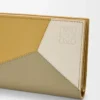Kompakte Geldbörse Puzzle aus klassischem Kalbsleder in Ginger/Sea Salt