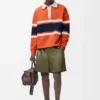 Langärmliges Poloshirt aus Baumwolle Orange/Marineblau