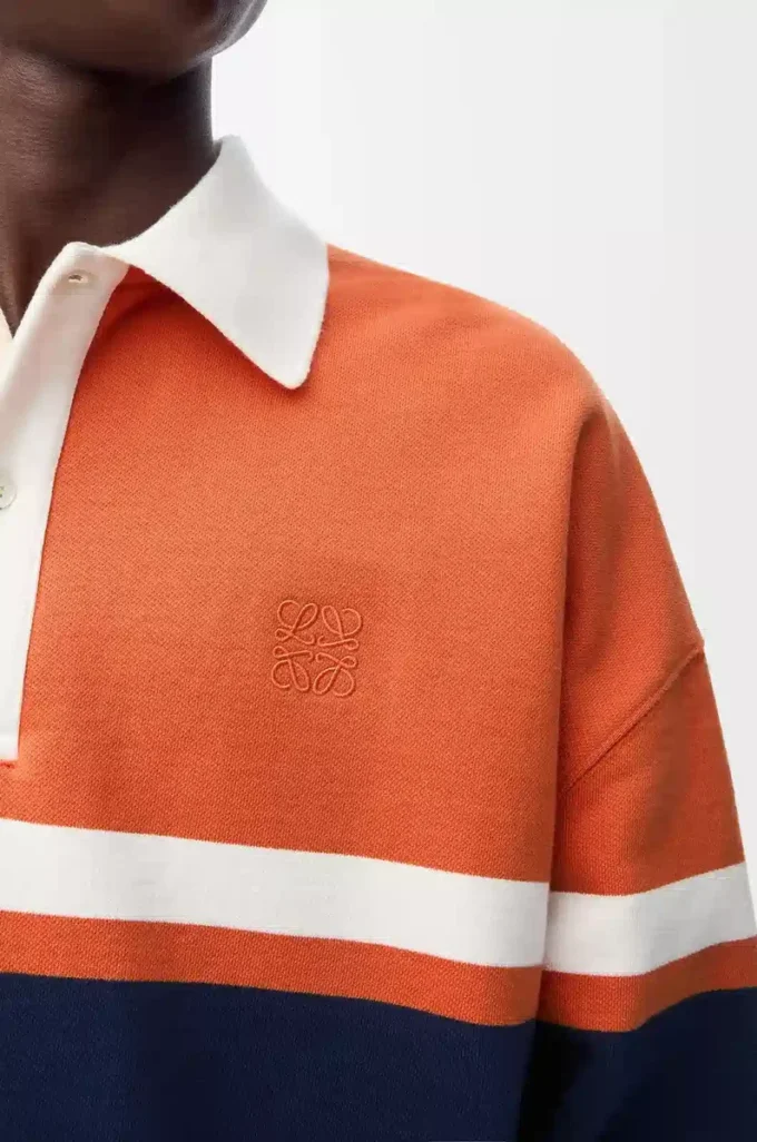 Langärmliges Poloshirt aus Baumwolle Orange/Marineblau